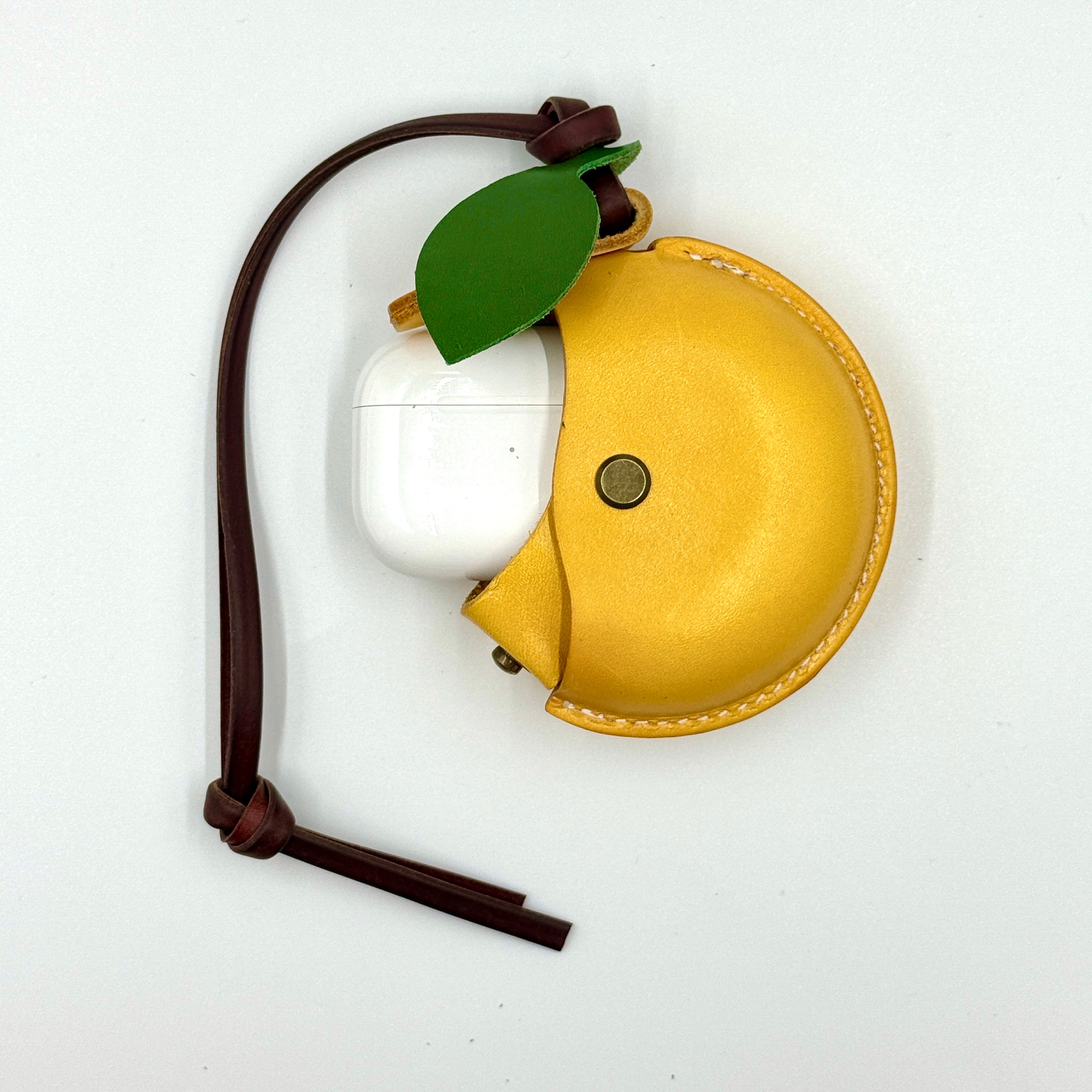 lemon airpod case with airpod front shot
