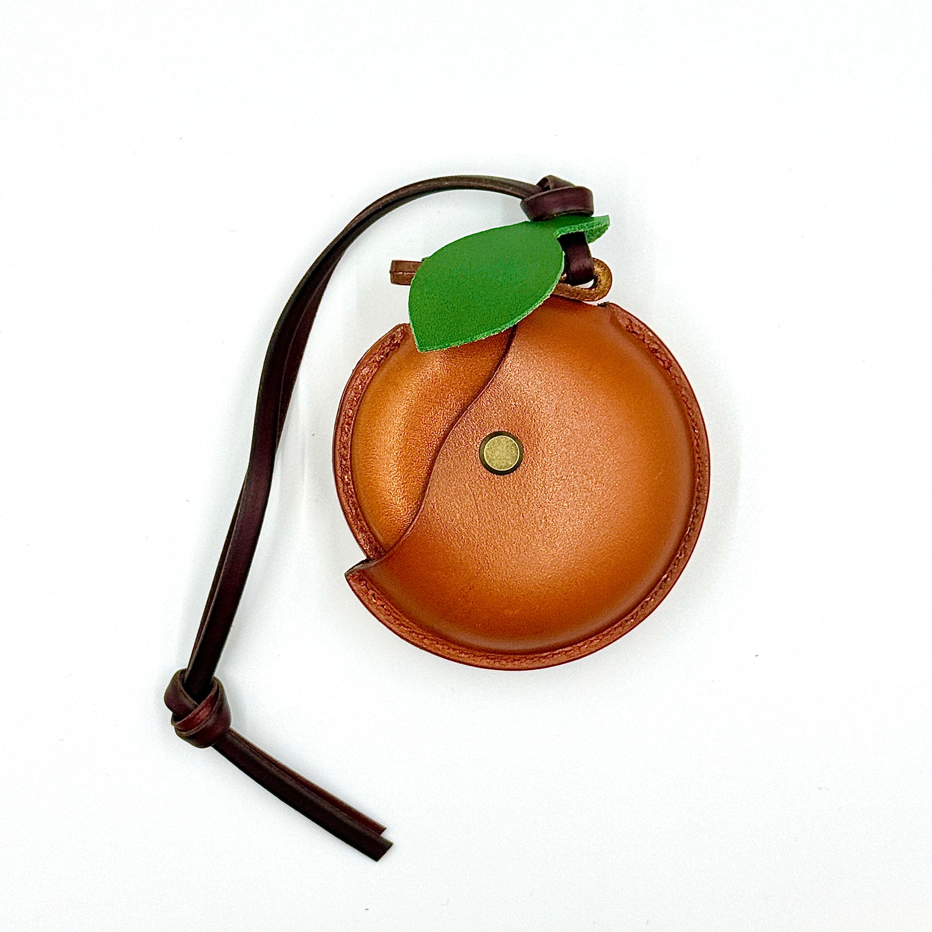 persimmon airpod charm front